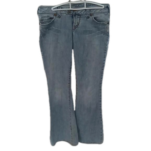 Silver Jeans Denim - (125) SILVER JEANS FADED & LIGHTLY DISTRESSED WITH TURQUOISE  ACCENTS FLARE LEGS